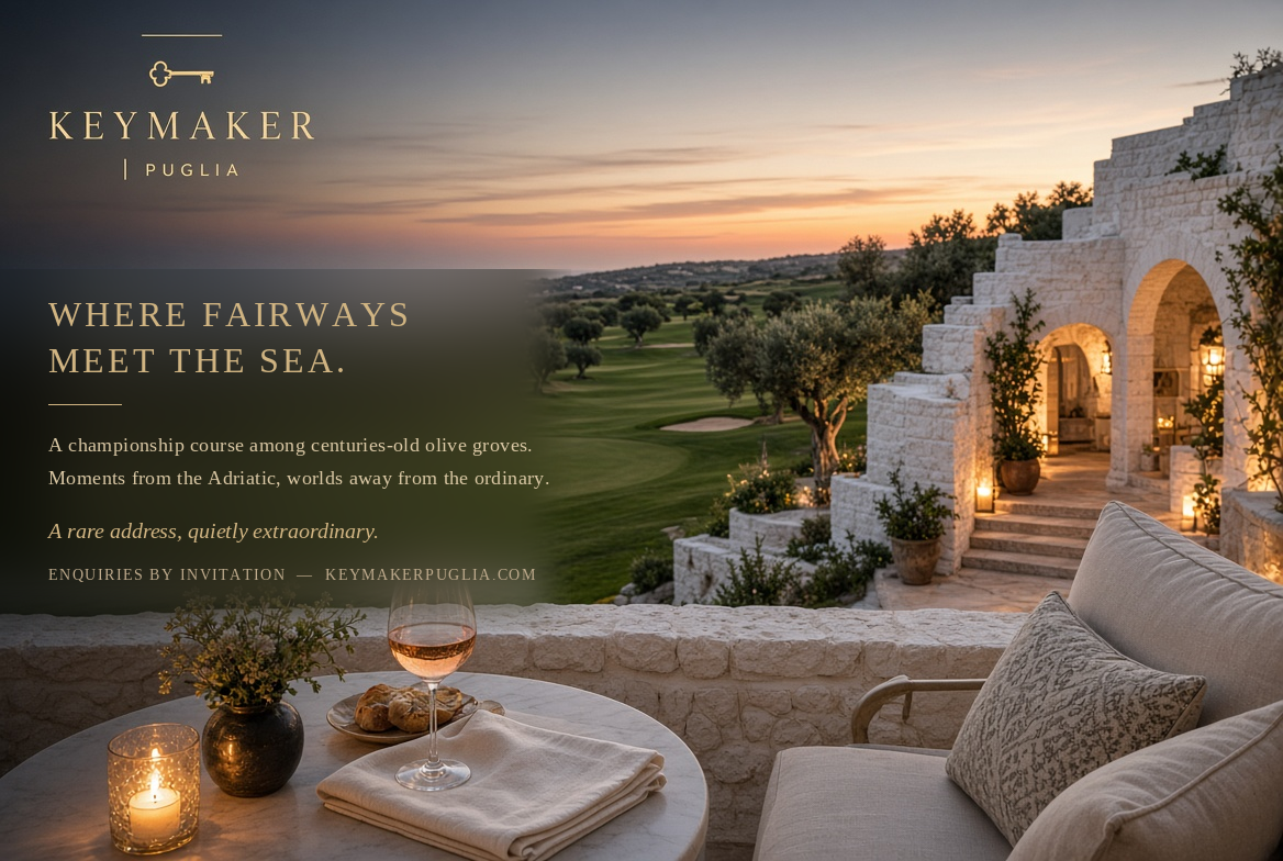 Masseria terrace at dusk overlooking the olive fairways of Puglia